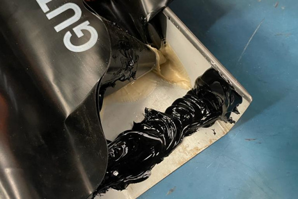 Sealing end of gutter with silicone